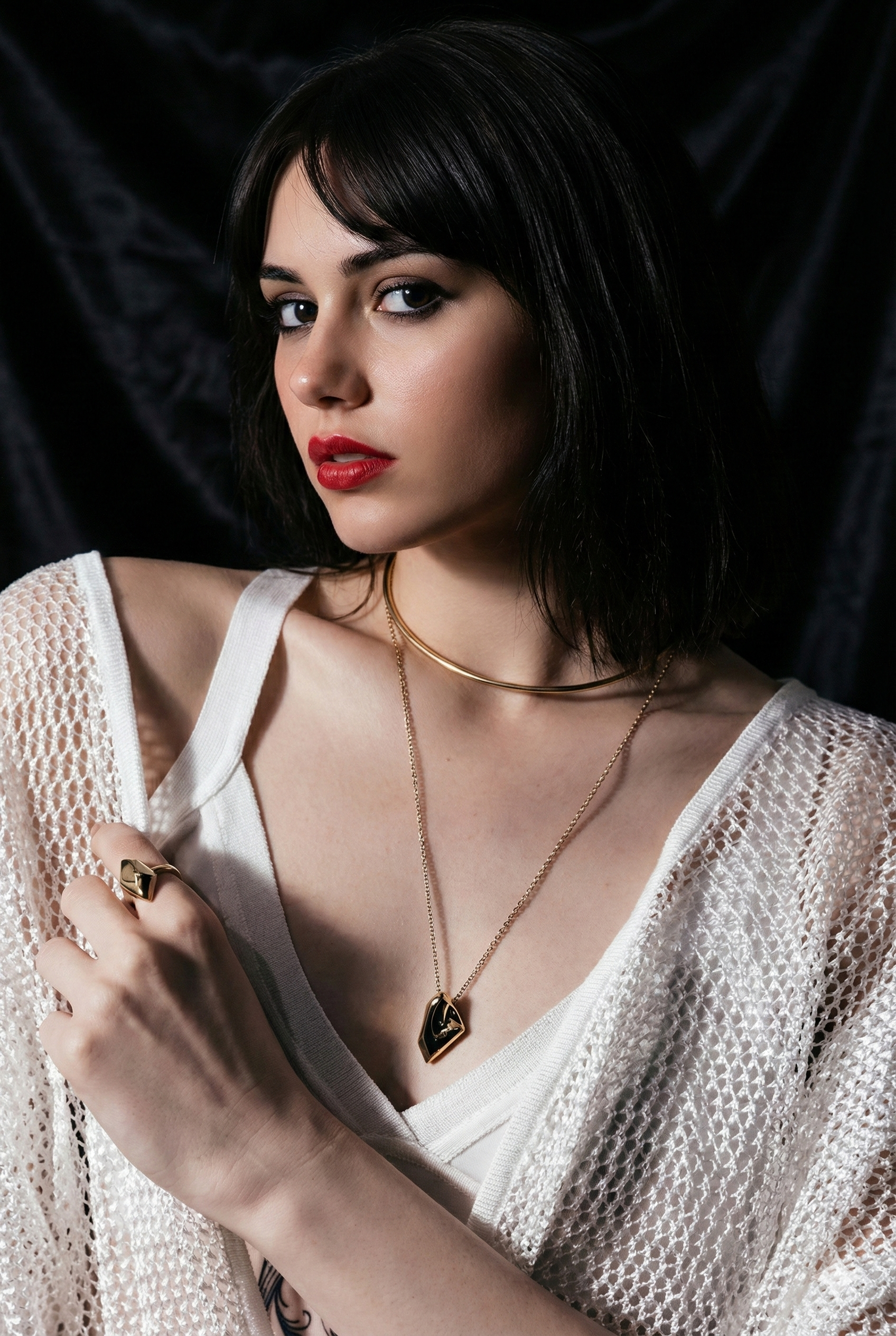 Elegant woman adorned with premium gold jewellery